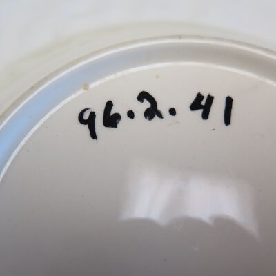 Bottom of bowl.: Origsize: 2.25" (h) x 9.25" (d; Origformat: Artifact