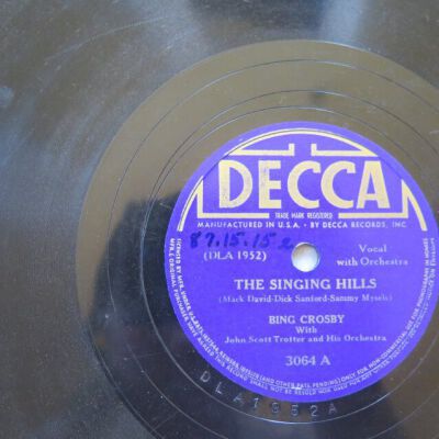 Close up of label on A side of record.: Origsize: 9.75" (diam); Origformat: Artifact