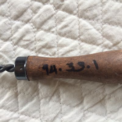 Object id marking on rug beater.: Origformat: Artifact