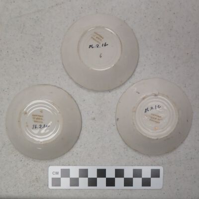 Underside of three associated dishes.: Origsize: 3.25"(Dia); Origformat: Artifact