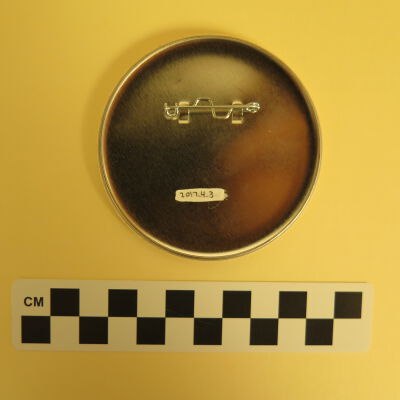 Back of button.: Origsize: 0.5" (h) x 3" (dia); Origformat: Artifact