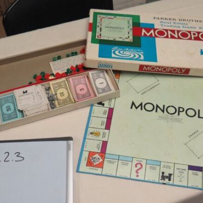 Monopoly box and game pieces.: Origsize: 1.5" (h) x 10" (w) x; Origformat: Artifact
