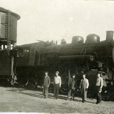 Six rail workers in and around a steam locomotive, circa 1930: Origsize: 4.25" x 6.25"; Origformat: Print-Photographic; Resolution: 800dpi