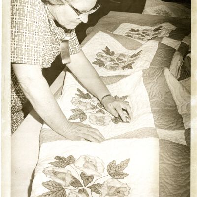 "Needlework Lover" - Woman examining needlework