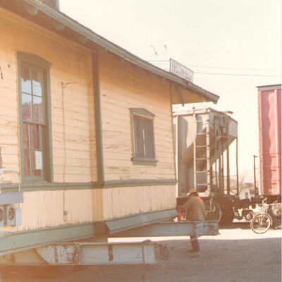 Moving Broomfield Depot with Train in Background