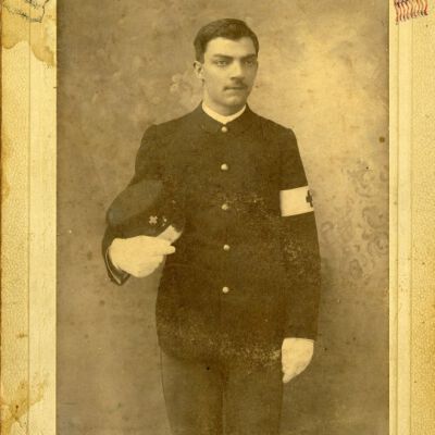 Cabinet card photograph of William Kruegel in uniform, 1898: Origsize: 5" x 6.5"; Origformat: Print-Photographic; Resolution: 800dpi