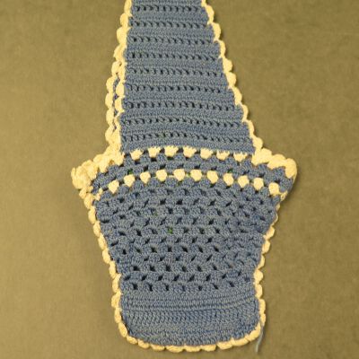 Back of wall hanging.: Origsize: 5" (w) x 10" (l); Origformat: Artifact