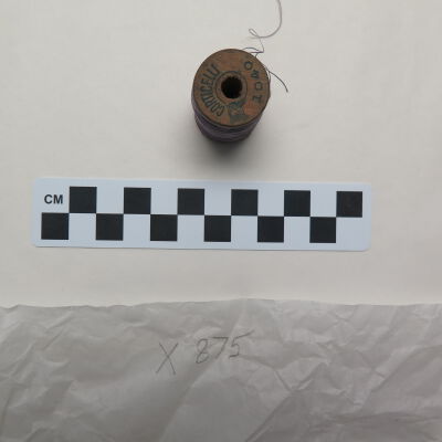 Top of spool.: Origsize: 1.25" (h) x 0.75" (d; Origformat: Artifact
