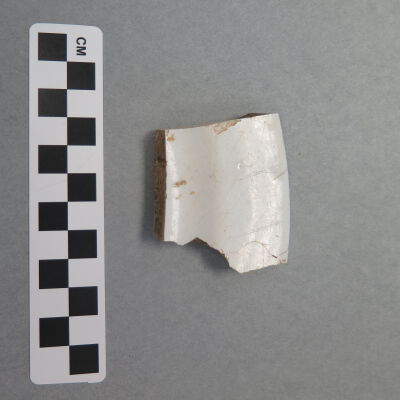 Other side of fragment.: Origsize: .5" (h) x 2" (w) x 2; Origformat: Artifact