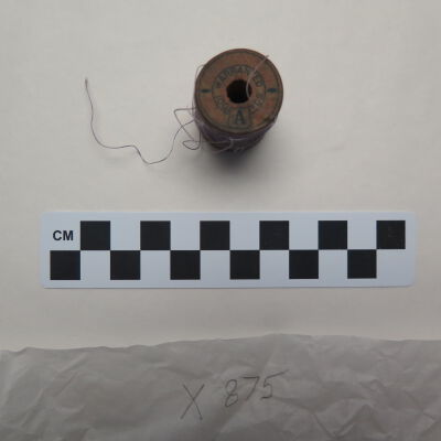 Bottom of spool.: Origsize: 1.25" (h) x 0.75" (d; Origformat: Artifact