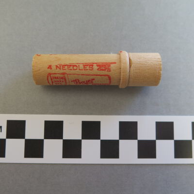 Continued text on side of case.: Origsize: 2.5" (h) x 0.75" (di; Origformat: Artifact
