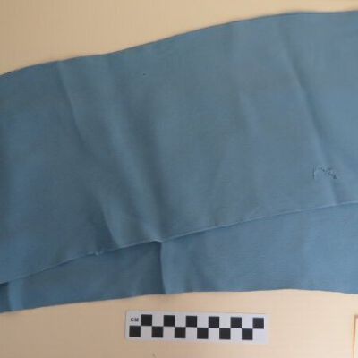 Scarf folded, showing holes: Origsize: 7" (w) x 43" (l); Origformat: Artifact