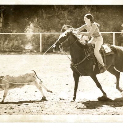 "Senior Girls" - Girl on horseback roping calf - Broomfield Days?