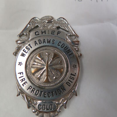 Front of hat badge.: Origsize: 3" (h) x 2" (w); Origformat: Artifact