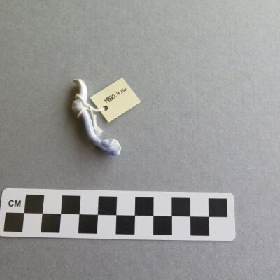 One side of cup handle.: Origsize: .5" (h) x 4.5" (w) x; Origformat: Artifact