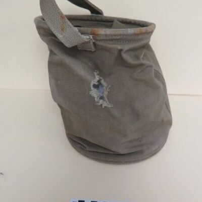 Largest hole in bucket: Origsize: 16"(h) x 8"(dia); Origformat: Artifact