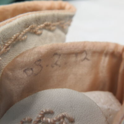Number inside shoes.: Origsize: 2.25" (h) x 2.25" (w; Origformat: Artifact