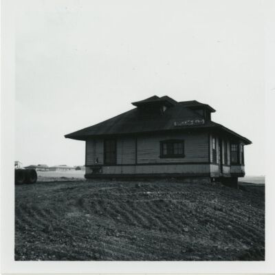 Back view of the Broomfield train depot at its new location, 1976: Origsize: 3.5" x 3.5"; Origformat: Print-Photographic; Resolution: 1500dpi