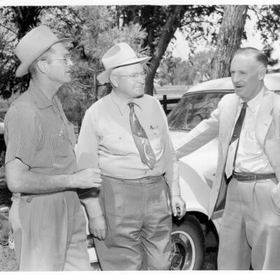 Three men Standing In Front of the Broomfield Heights Ambulance