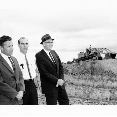 Three Men at Construction Site