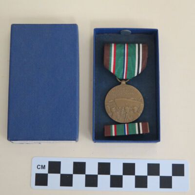 Box with medal inside: Origsize: 1" (h) x 2"(w) x 4"; Origformat: Artifact