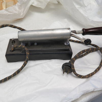 Other side of curling iron.: Origsize: 5.25" (h) x 3" (w) x; Origformat: Artifact