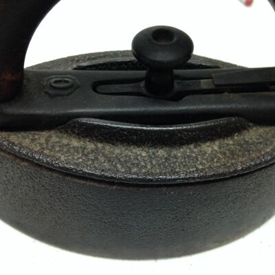 Close up of iron base.: Origsize: 5.25" (h) x 3" (w) x; Origformat: Artifact