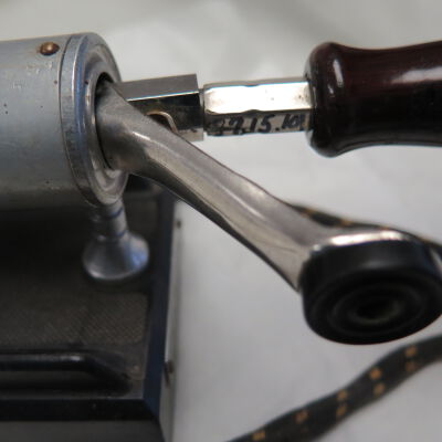 Number on handle of curling iron.: Origsize: 5.25" (h) x 3" (w) x; Origformat: Artifact