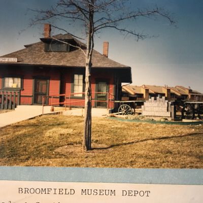 Photo of depo from Questers poster, circa 1993, showing two baggage carts