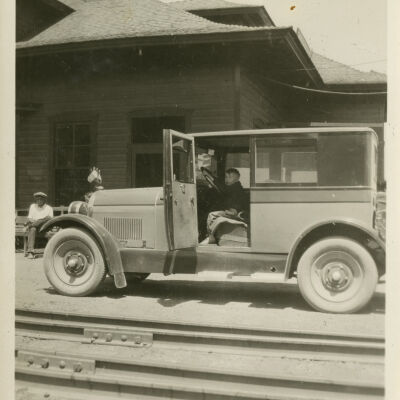Robert Hillen in Davis Automobile at Superior Train Depot