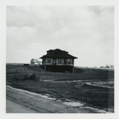 Side of Broomfield train depot on its new foundation, 1976: Origsize: 3.5" x 3.5"; Origformat: Print-Photographic