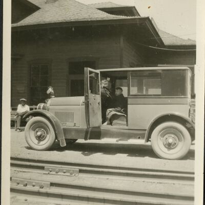 Robert Hillen in Davis automobile at Superior train depot, circa 1927: Origsize: 3 1/2" x 5 3/4"; Origformat: Print-Photographic; Resolution: 300dpi