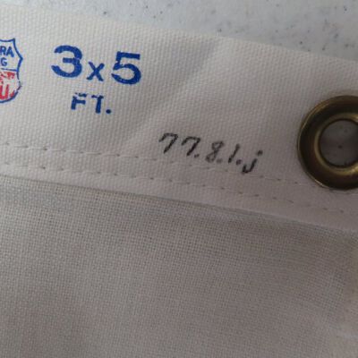 Close up of number on flag.: Origformat: Artifact