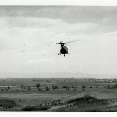 Flight for Life helicopter flying near a car accident site, Highway 287