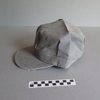 Side of hat.: Origsize: 5" (h) x 9.5" (w) x; Origformat: Artifact