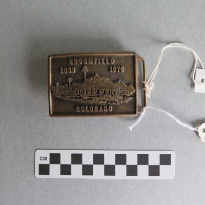 Front of belt buckle.: Origsize: 2.25" (h) x 3" (w); Origformat: Artifact