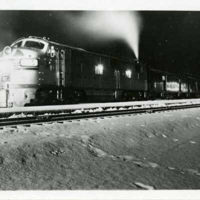 Texas Zephyr passenger train in snowy landscape at night, 1958: Origsize: 3" x 4"; Origformat: Print-Photographic; Resolution: 1300dpi