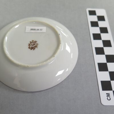 Bottom of saucer.: Origformat: Artifact