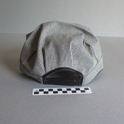 Back of hat.: Origsize: 5" (h) x 9.5" (w) x; Origformat: Artifact