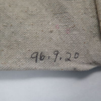Back of apron.: Origsize: 10.5" (h) x 13.5" (w; Origformat: Artifact