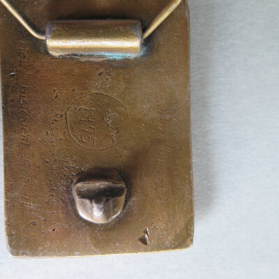 Back of belt buckle.: Origsize: 2.25" (h) x 3" (w); Origformat: Artifact