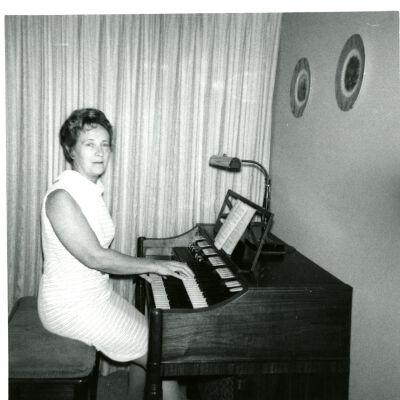 Woman playing organ