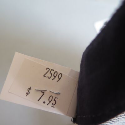 Back of tag in hat.: Origsize: 5" (h) x 9.5" (w) x; Origformat: Artifact