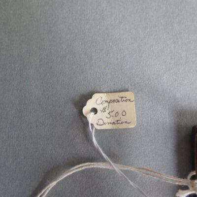 Tag on belt buckle.: Origsize: 2.25" (h) x 3" (w); Origformat: Artifact