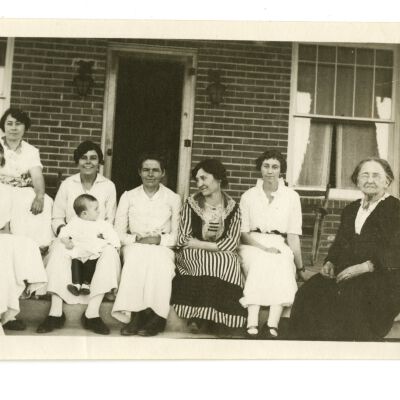 Frances Cron, Ellenor Brown, and Blanche Brown on Porch with Other Women
