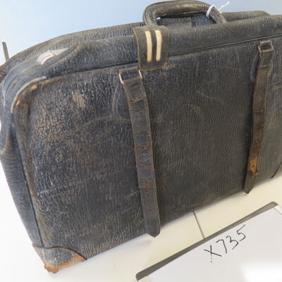 Other side of suitcase: Origsize: 16" (h) x 26" (w) x; Origformat: Artifact