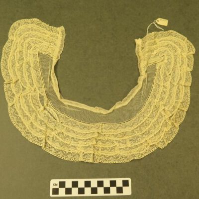 Front of collar.: Origsize: 4.5" (w) x 17.5" (l); Origformat: Artifact