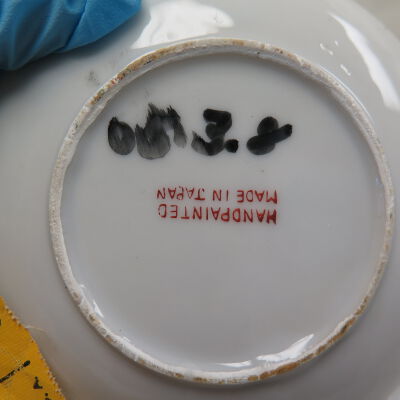 Bottom of the saucer: Origsize: 4" (dia); Origformat: Artifact