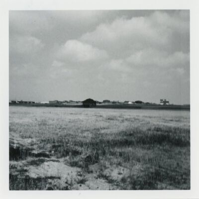 Field overlooking the Broomfield train depot at its new site, 1976: Origsize: 3.5" x 3.5"; Origformat: Print-Photographic