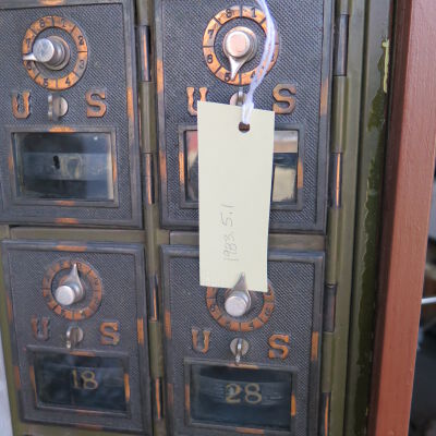 Close up of number on boxes on left side of display.: Origformat: Artifact